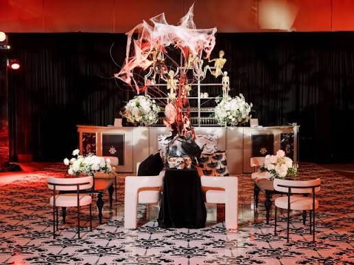 Elegant and Spooky Halloween-Themed After Party Decor