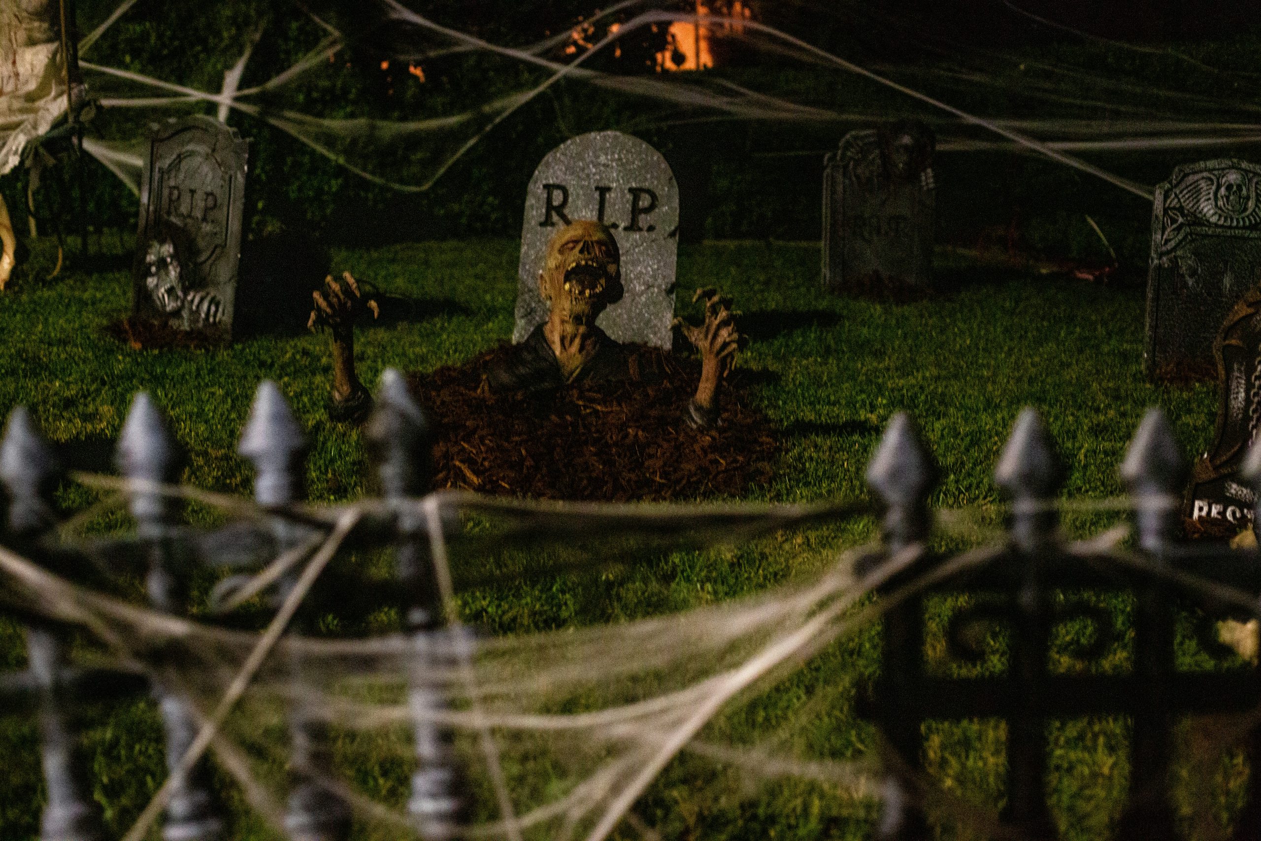 Halloween decorations in LA. Graveyard with a zombie.