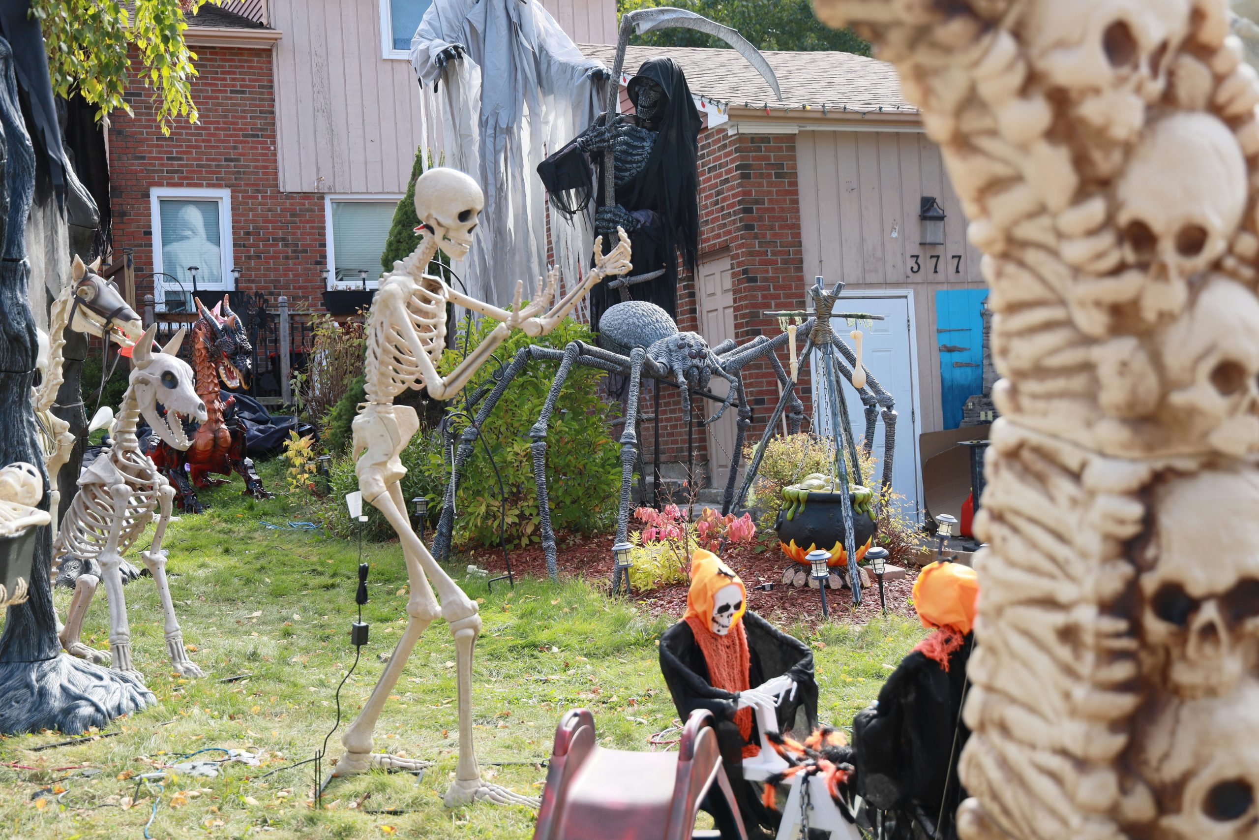 Halloween decorations with skeletons and grim reapers