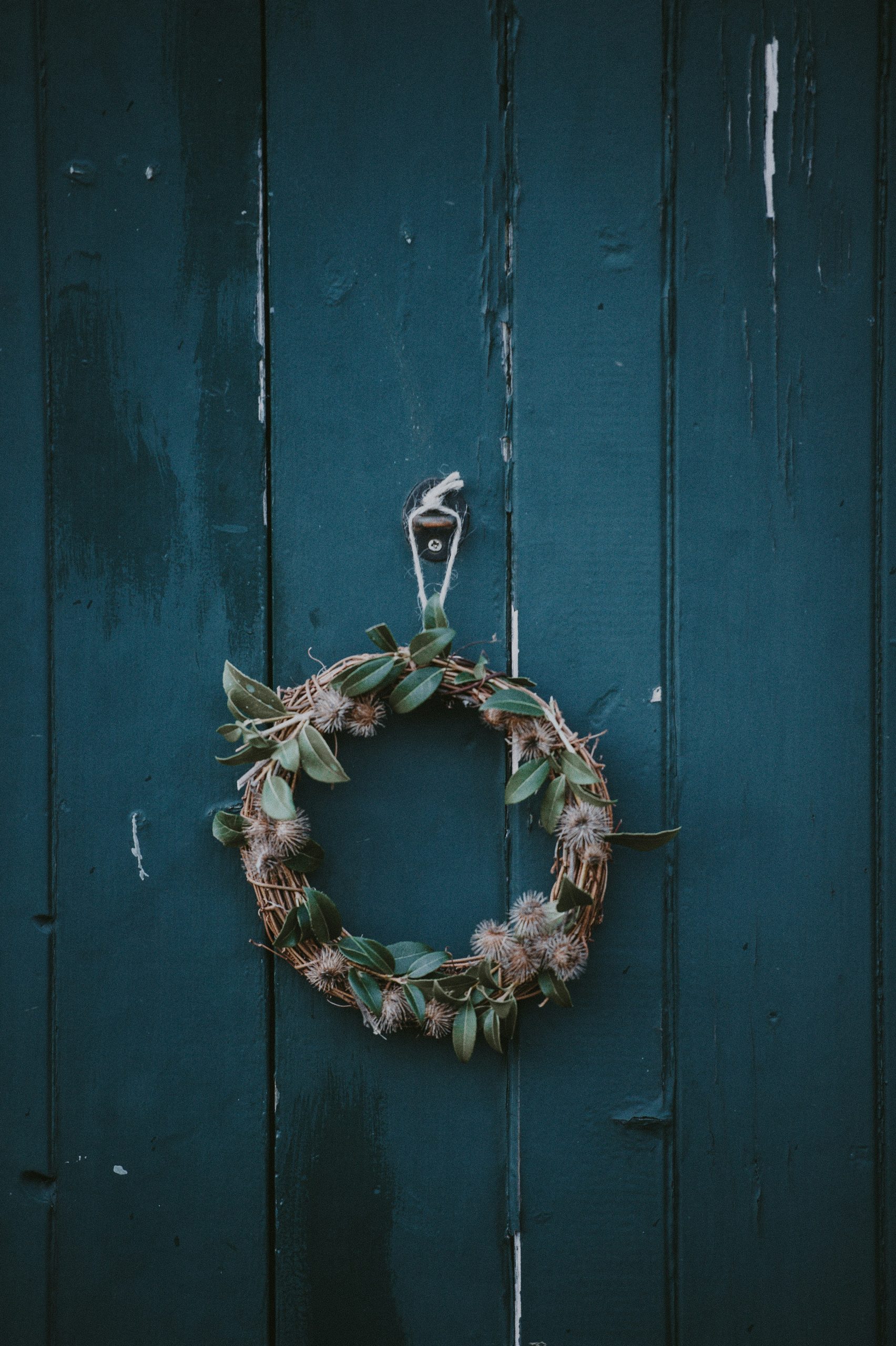 Homemade wreath on blue door