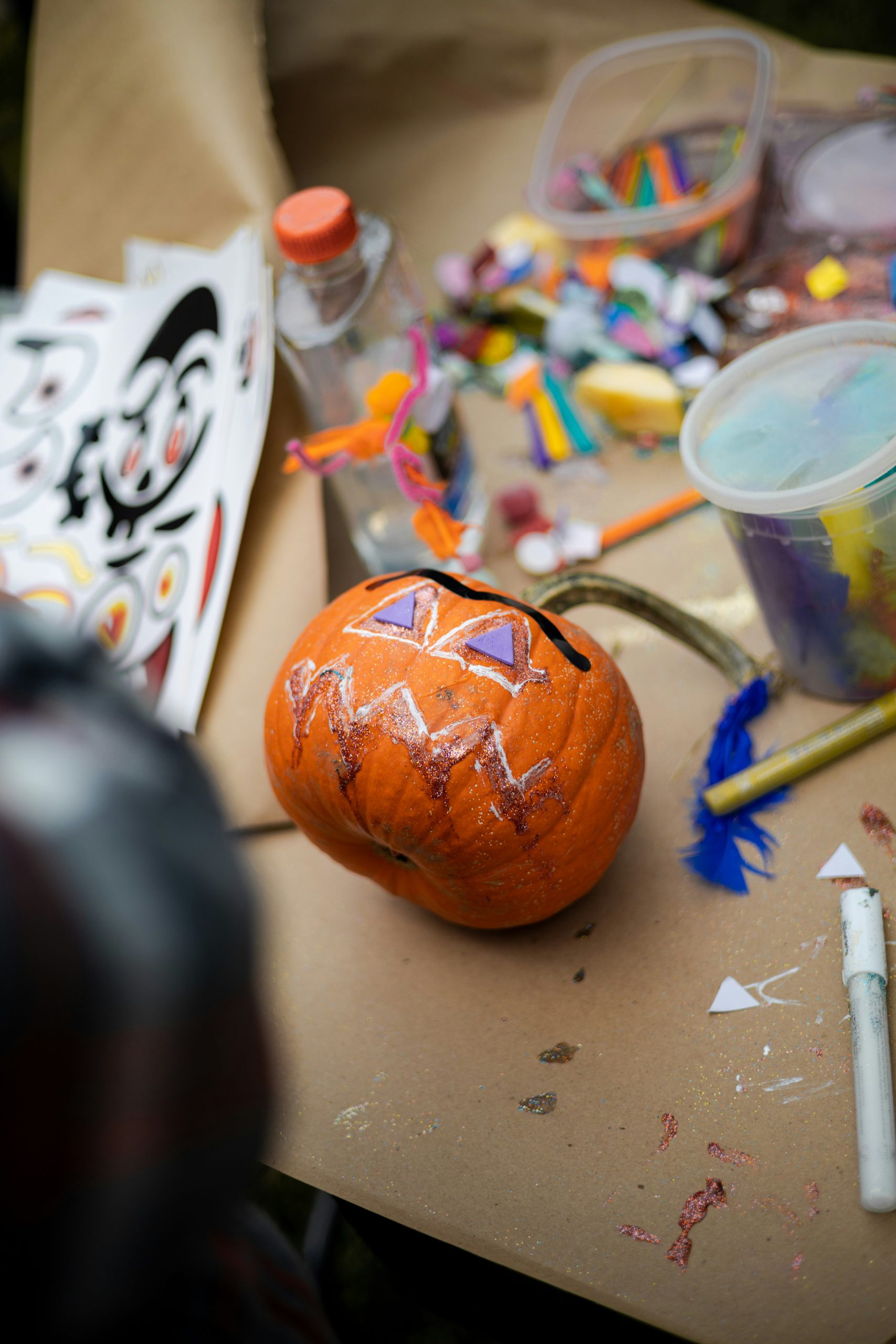 Pumpkin being decorated