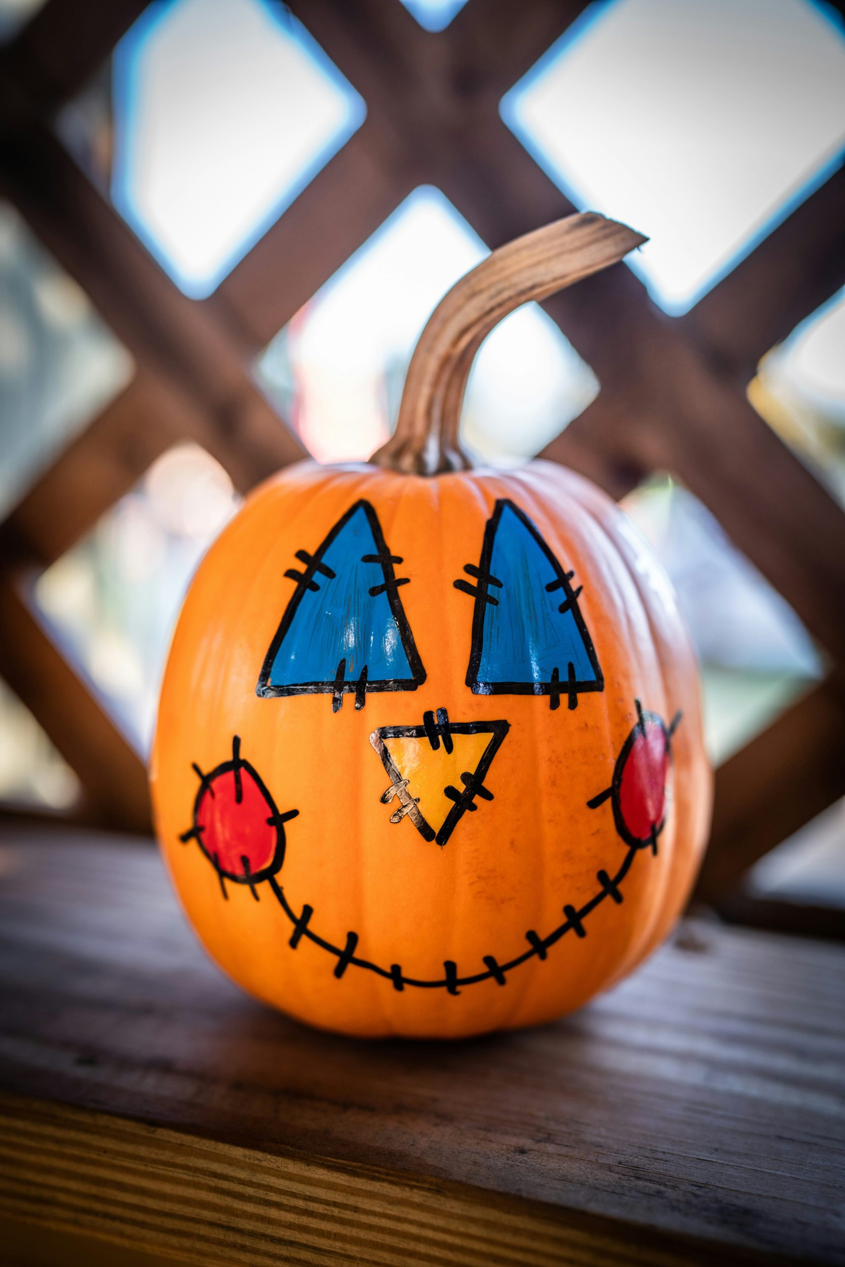 Scarecrow painting on pumpkin