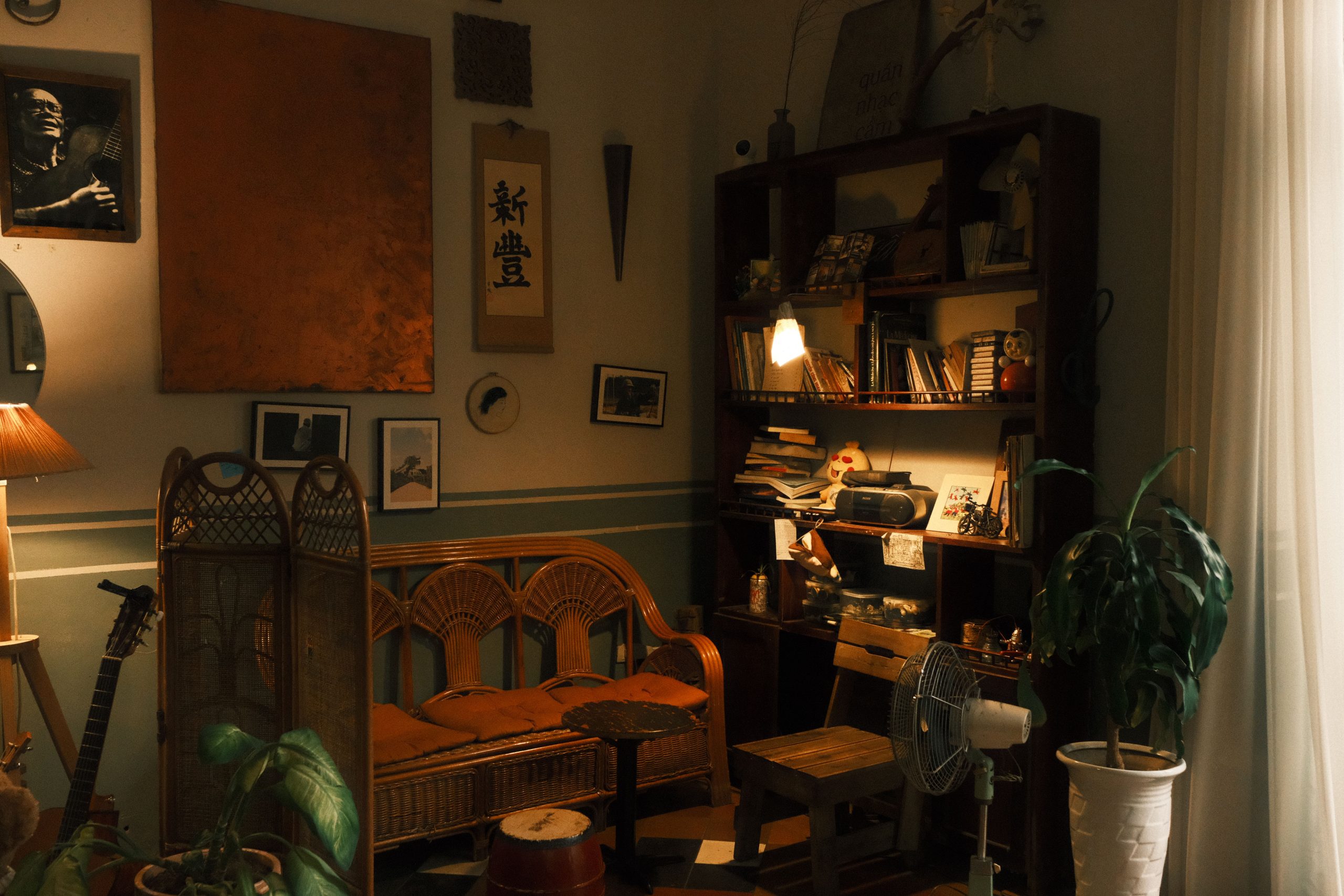 Warm and inviting vintage reading room with bookshelves and natural lighting.