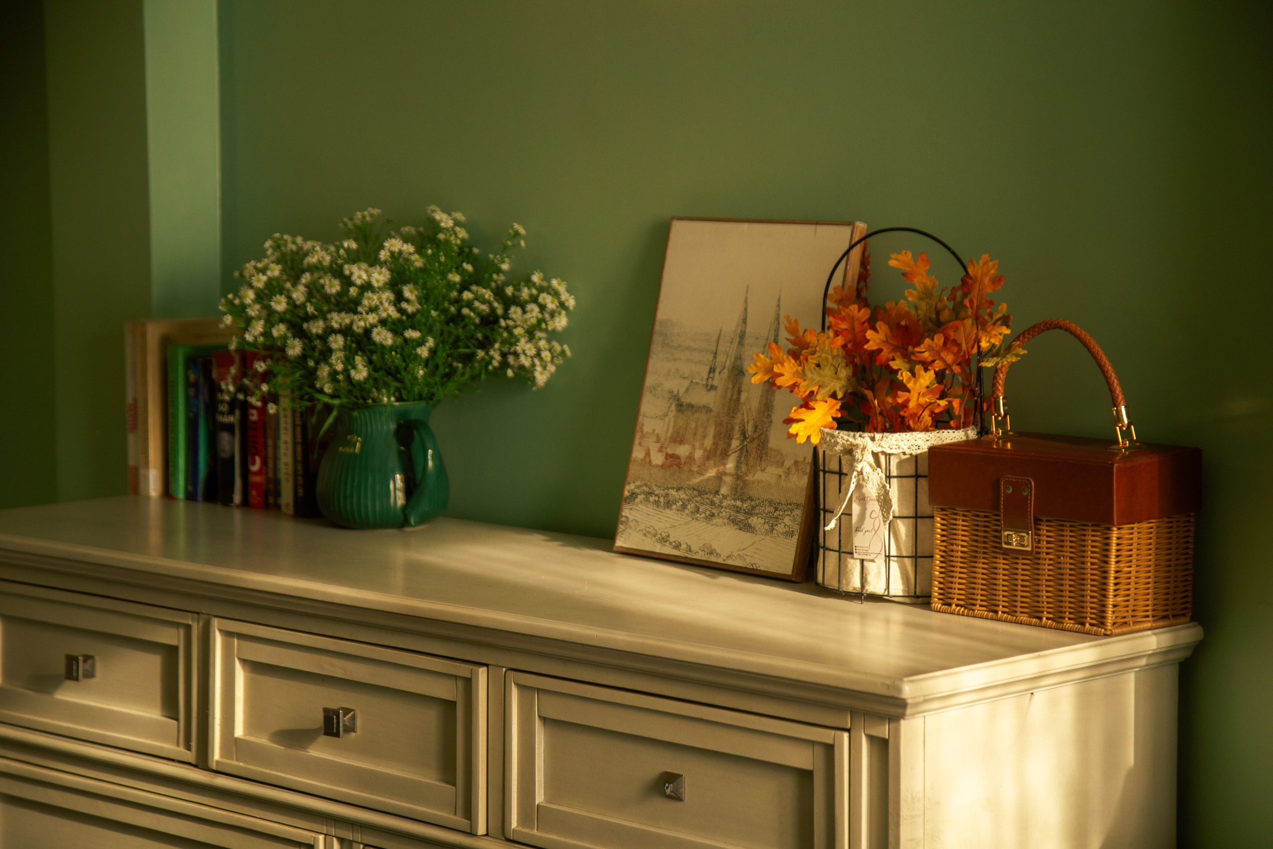 Warm interior scene with fall accents, soft lighting, and elegant furnishings. Perfect for autumn home decor inspiration.