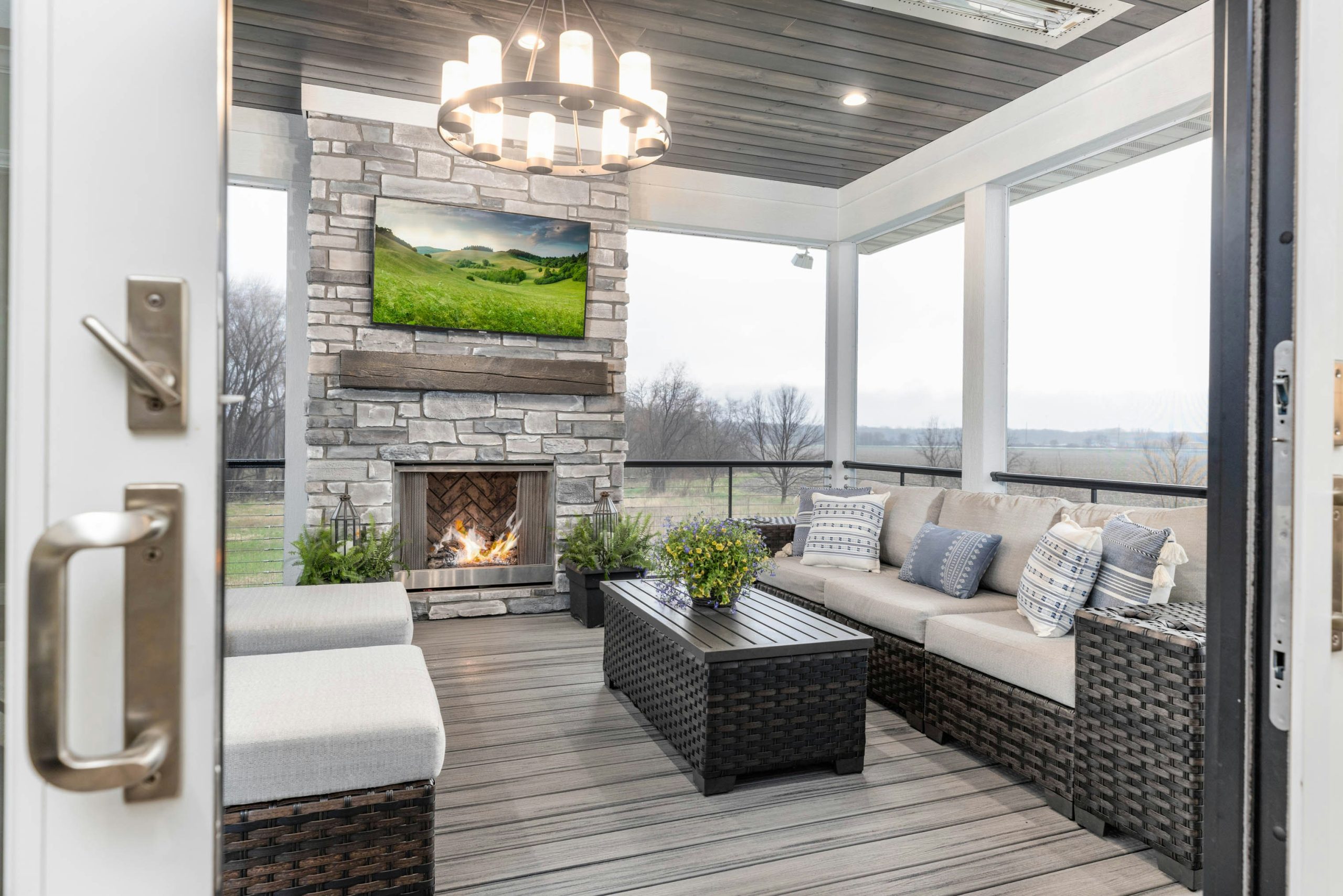 a living room with a couch a table and a fire place