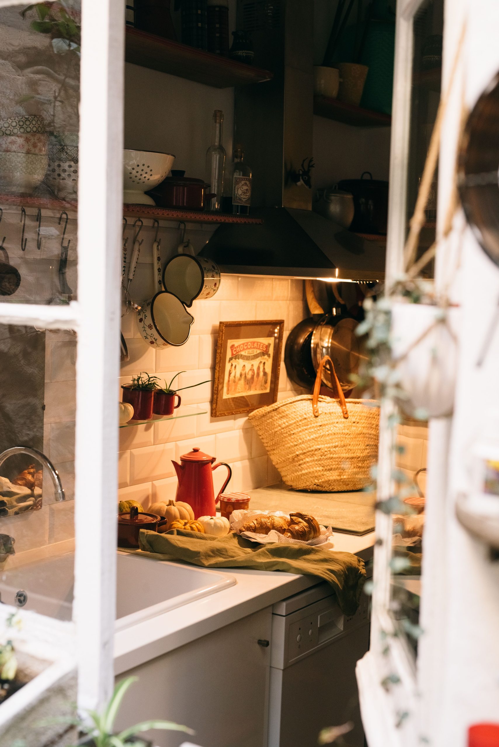 Charming rustic kitchen interior with vintage elements and warm lighting.