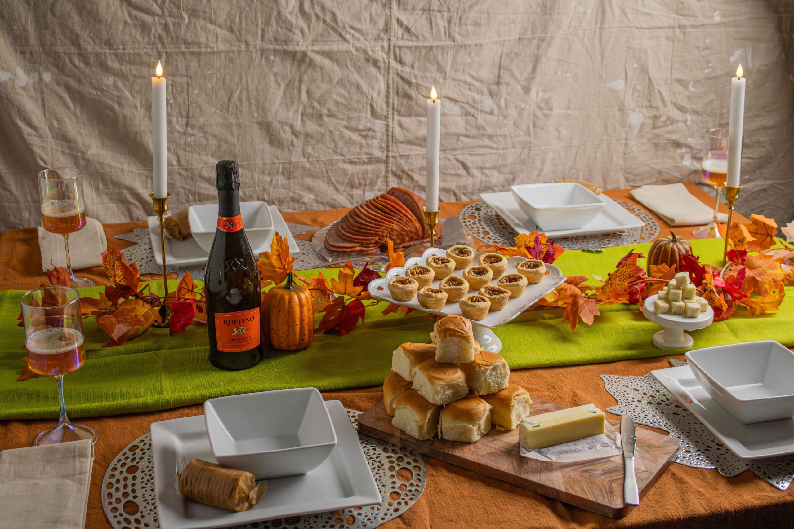 Elegant Thanksgiving table setup with traditional dishes and autumn decor in Norfolk, Virginia.