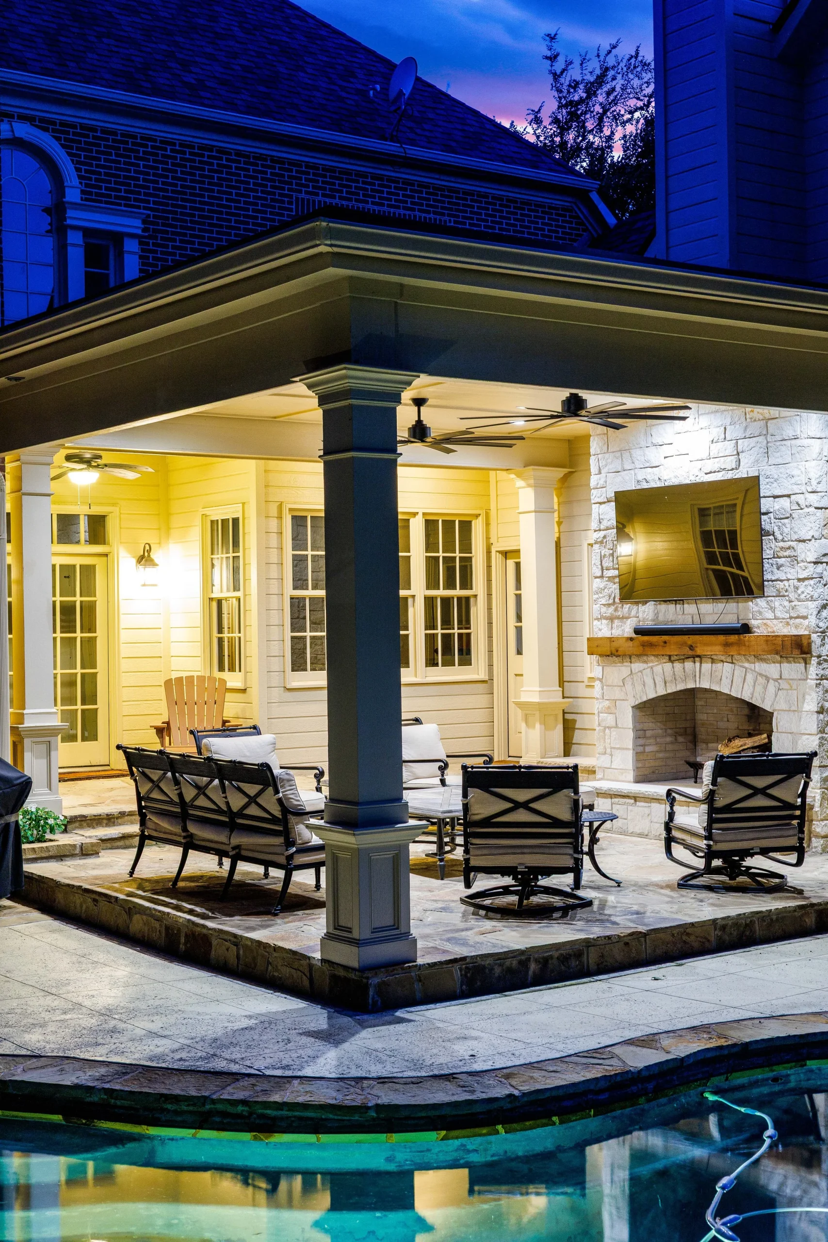 McKinney Patio Cover with Fireplace, Flagstone Pavers & Poolside Hardscapes | Texas Outdoor Living