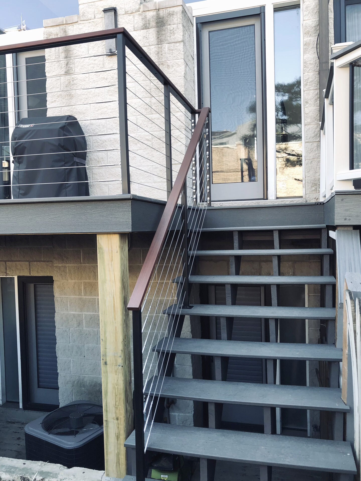 Modern wrought iron & wood & cable railings painted satin black in Chicago | Signature Metal Works