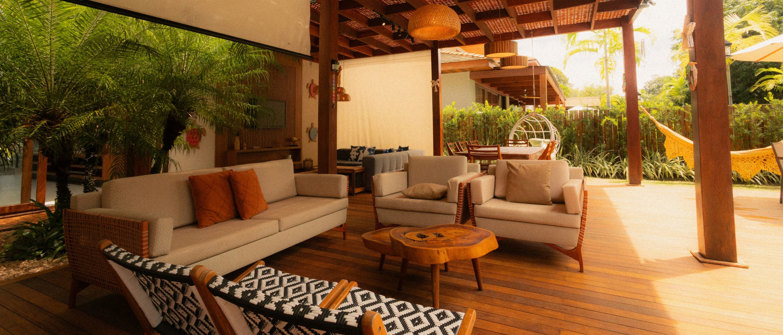 Outdoor living room with sofas and coffee table