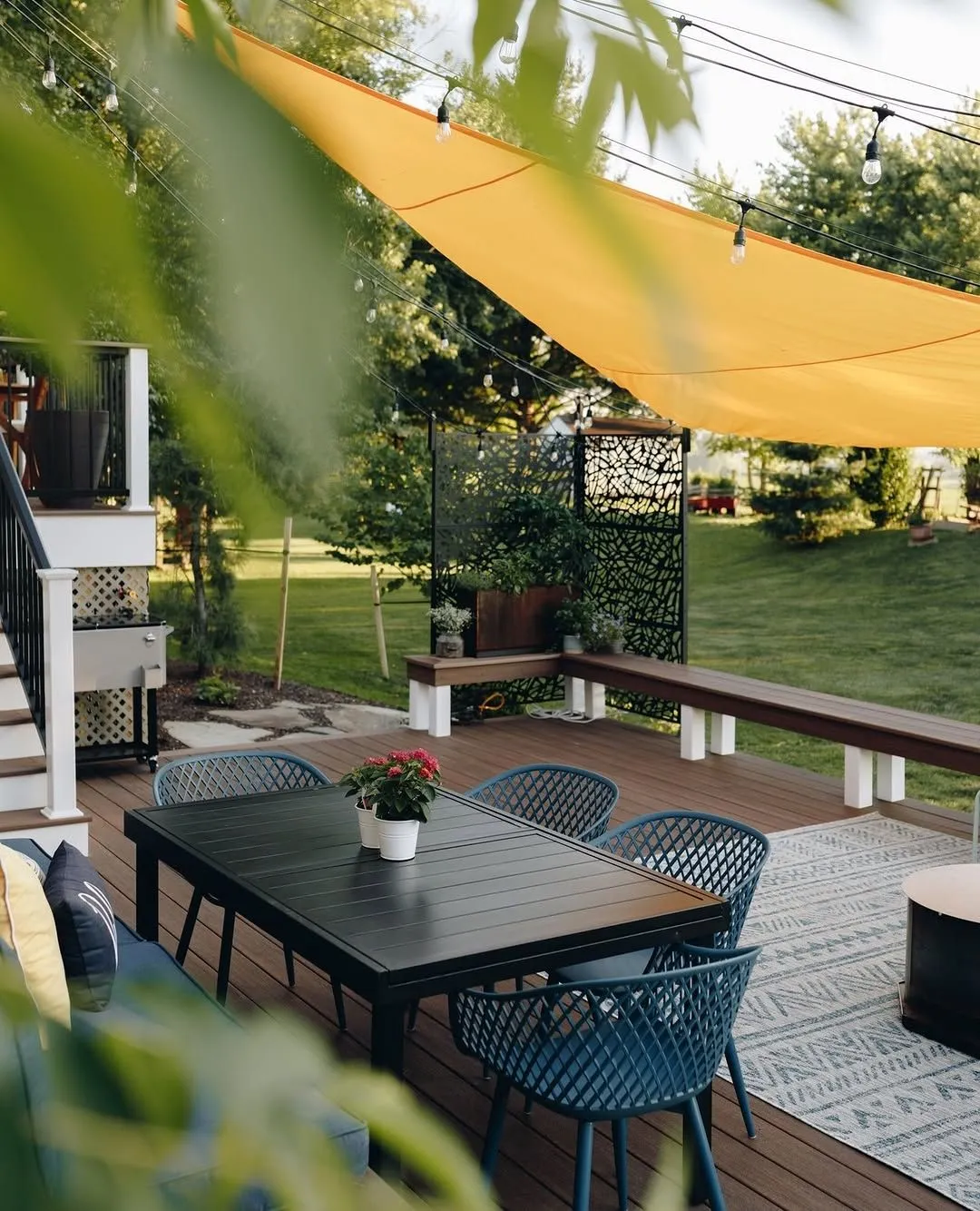 More Homeowners Are Replacing Patio Umbrellas With Shade Sails