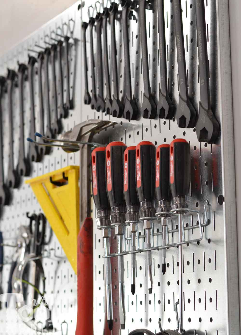 organize-screwdrivers-on-pegboard - Her Tool Belt